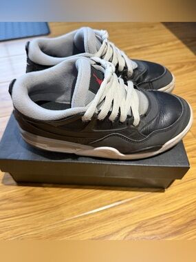 Preloved Air Jordan 4 RM BG PRM in Black, Gray & White with Red Jumpman Size 5Y